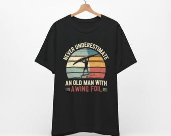 Old Man With A Wing Foil Unisex T Shirt, Surfing, Winging, Hydrofoiling, Lake Sport, Windsurfing, Kiteboarding, Gift For Grandfather, Senior