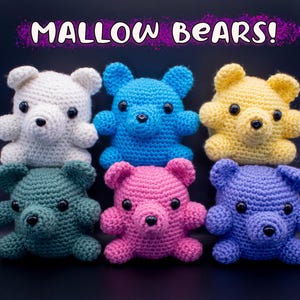 May include: Six colorful, crocheted bear toys in white, blue, yellow, green, pink, and purple. Each bear has a round body, small ears, and a black nose and eyes. The text "MALLOW BEARS!" is above the bears.