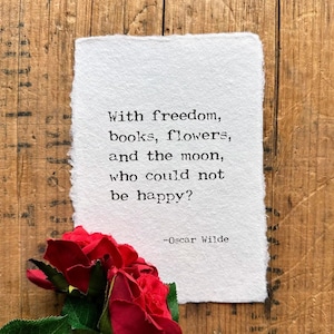With freedom, books, flowers, and the moon, who could not be happy? Oscar Wilde quote print in typewriter font on handmade cotton paper