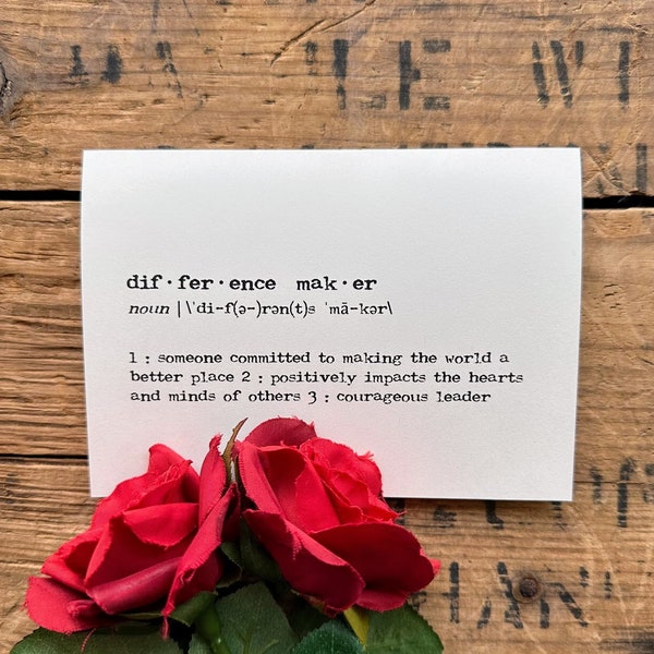 difference maker definition card in typewriter font with envelope and rose sticker, volunteer, non-profit donor, team leader, manager