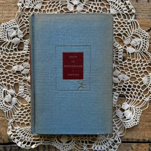 Vintage Alice&#39;s Adventures in Wonderland, Through the Looking Glass, and Hunting of the Snark book by Lewis Carroll, mad hatter tea party
