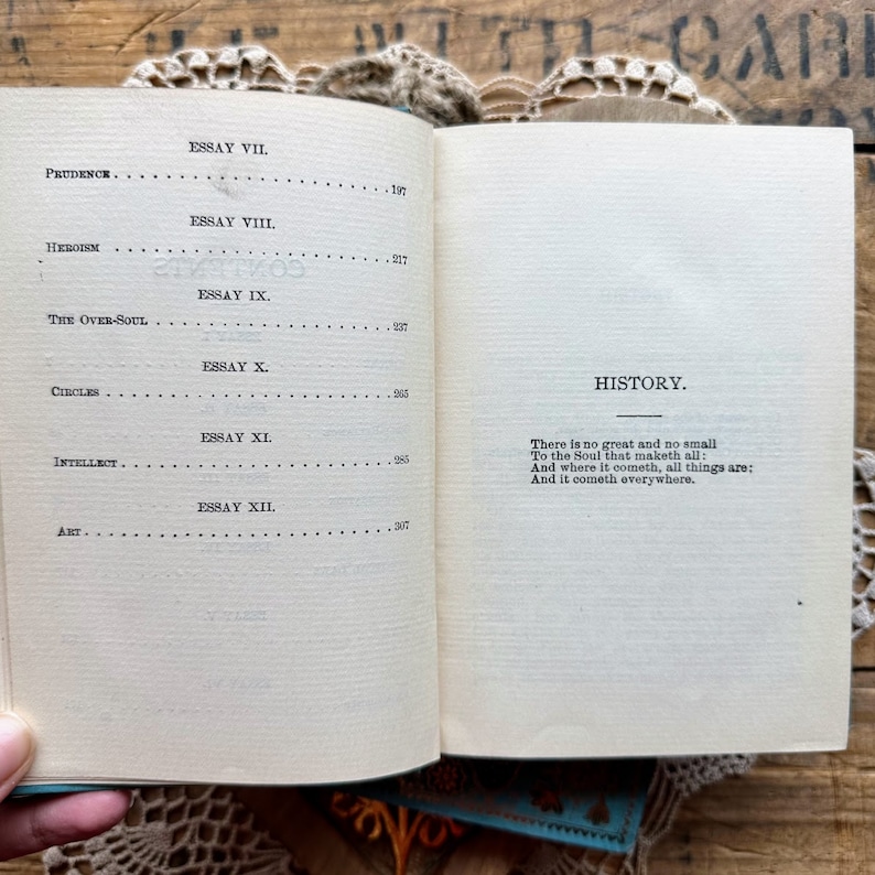 May include: A page from a book with the title "History" and a poem about the soul. The poem reads: "There is no great and no small To the Soul that maketh all: And where it cometh, all things are: And it cometh everywhere."