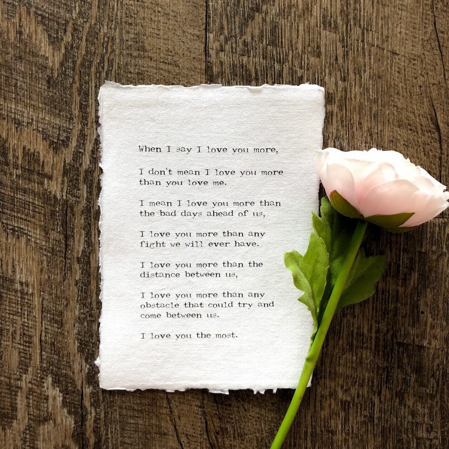 When I say I love you more, the most poem print in typewriter font on…
