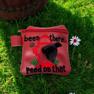 Poop bag holder, Peed on that
