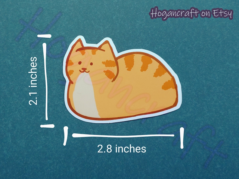 Puede incluir: Pegatina de gato de dibujos animados naranja y blanco, de 2,8 pulgadas de ancho y 2,1 pulgadas de alto. El gato est&aacute; tumbado de lado con las patas metidas debajo del cuerpo.