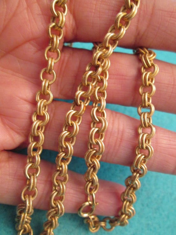 Beautiful 12kt 24 long designer chain very pretty Looks amazingly like 14kt.!! Figaro style