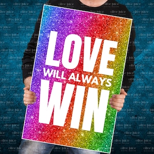 May include: A rainbow glitter background with the text "LOVE WILL ALWAYS WIN" in white letters.