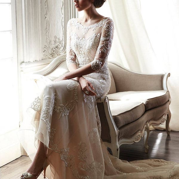 The Maggie Sottero SS 2015 Verina Wedding gown with attached vintage rhinestone belt