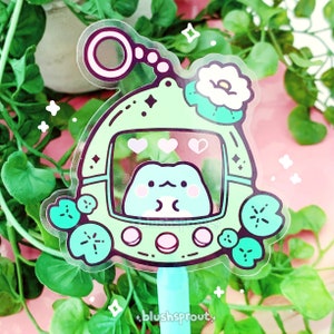 Froggiegotchi Frog Tamagotchi 3" Clear Vinyl Sticker | Cute Frog Sticker, Kawaii Froggy Cottagecore Kidcore Water Bottle, Laptop, Car Decal