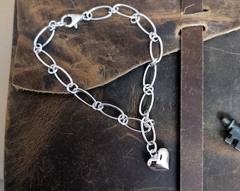 5.4 mm Sterling Silver Paperclip Chain bracelet with puffy heart charm