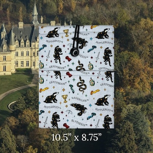 May include: A gray fabric pencil case with a repeating pattern of Hogwarts house crests and mascots. The crests include Gryffindor, Hufflepuff, Slytherin, and Ravenclaw. The mascots include a lion, badger, snake, and raven. The case measures 10.5 inches by 8.75 inches.