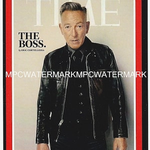 May include: TIME magazine cover featuring a man in a black leather jacket and black shirt. The cover has a red border with the TIME logo at the top and the text "THE BOSS." The cover is dated October 12, 2020.