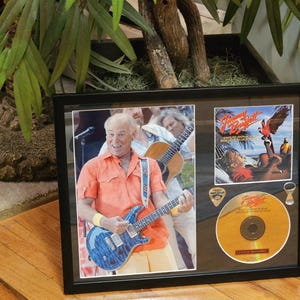 Jimmy Buffett Glass Framed Rock Piece with Color Photo,Gold CD, Limited Edition Guitar Pick and pop Top