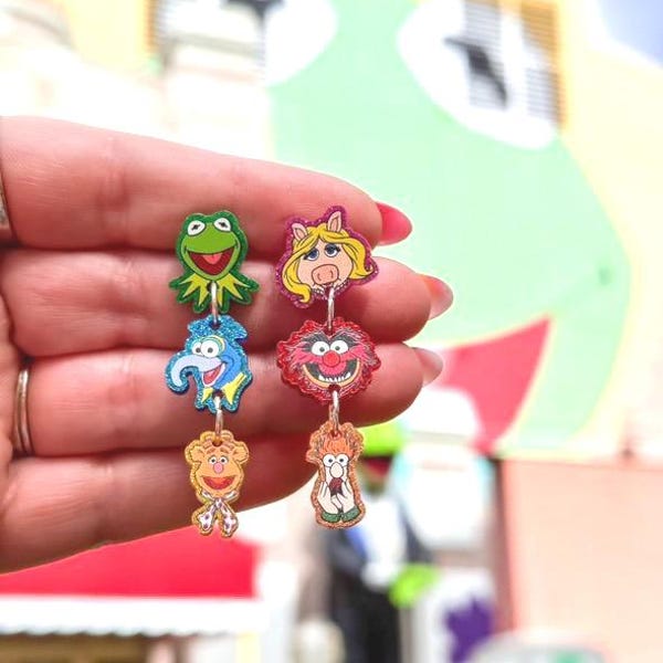 The Puppets dangle stud earrings