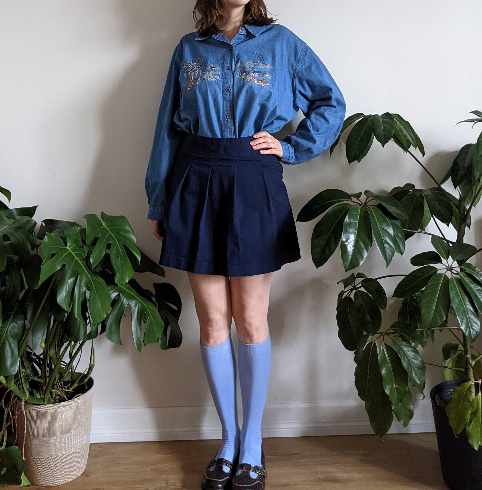 navy blue pleated mini skirt