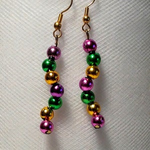 Long twisting Mardi gras earrings made with small acrylic purple gold and green beads New Orleans jewelry lightweight trendy fashion party