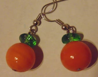 Halloween and Autumn orange glass bead pumpkin earrings with light green glass stem and holidays fun cute lightweight unusual odd unique mom