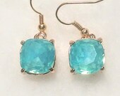 Light blue opalescent square faceted glass beads set in a gold metal prong setting earrings bridal showers baby maid of honor weddings trend