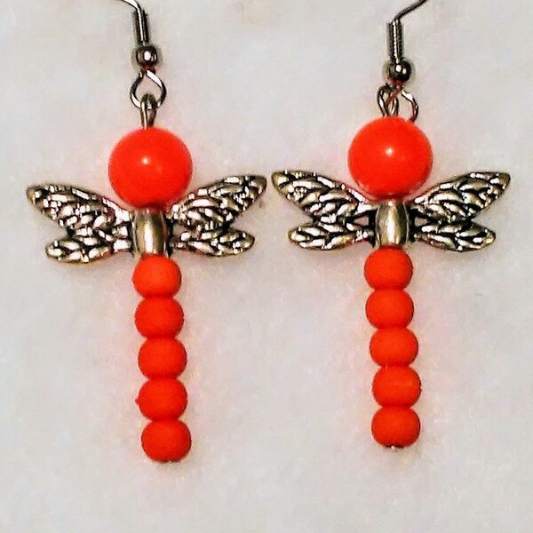 Solid orange long glass bead dragonfly earrings with silver plated wings matte trendy new moms fashions fun cute bugs insects picnics kids