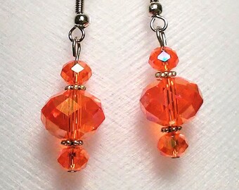 Faceted Orange Glass Bead Earrings with Silver Plated Spacers