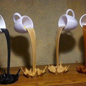 Drijvende koffiekop mok sculptuur keuken decor gieten morsen