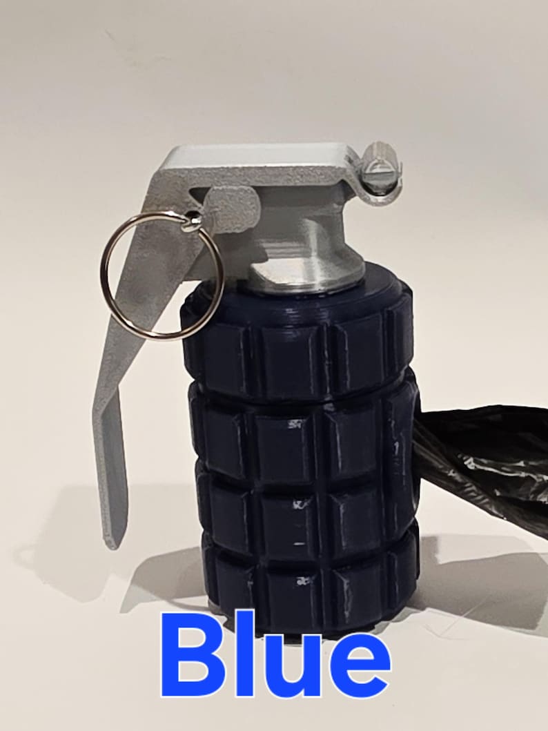 May include: A blue novelty grenade with a silver-colored top and pull ring. The word "Blue" is printed in blue at the bottom of the image. The grenade has a textured body.