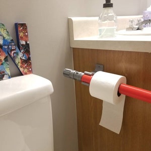 Star wars light saber toilet paper holder