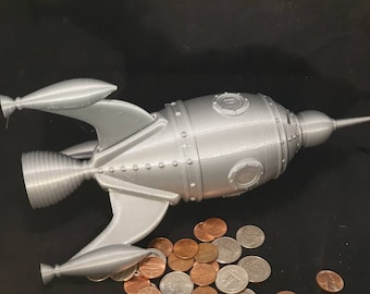 Banco de monedas de los barcos cohetes Banco de cerditos Decoración del dormitorio espacial