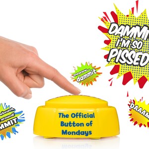 May include: A yellow plastic push button with the text The Official Button of Mondays printed in blue. Surrounding the button are comic-style speech bubbles with the phrases DAMMIT, I'M SO PISSED OFF, awwww... dammit, DAAAMIT, and INGRATES ABOUND, THEY'RE ALL AROUND! DAMMIT.