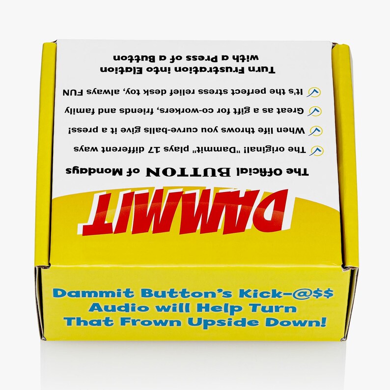 May include: A square yellow and white cardboard box featuring the text DAMMIT in large red letters. The box includes printed text describing the product as a button that plays 17 different sounds, intended for stress relief and as a gift.