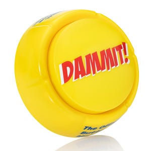 May include: A round yellow plastic button with the word DAMMIT! printed in bold red letters on the top surface. The side of the button features blue text that reads The Official Button, with a smooth, glossy finish and a circular design.