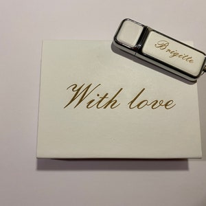 Customizable 32GB and 64GB faux leather USB flash drive with case.