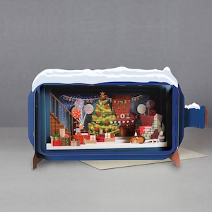 chien de famille, cadeaux, feu de cheminée, lumières, arbre de Noël, carte découpée au laser, message 3D dans une bouteille, carte pop-out, carte-cadeau 3D, carte faite main, 3D, chaise