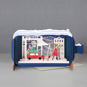 Escena navideña, perro, tienda, árbol, noria, pareja, lámpara, tarjeta cortada con láser, mensaje 3d en botella, tarjeta emergente, tarjeta de regalo 3d, tarjeta hecha a mano, 3d, tarjeta de regalo