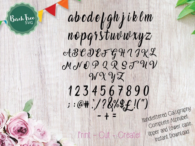 May include: Hand-lettered calligraphy font alphabet in black on a woodgrain background. The alphabet includes upper and lowercase letters, numbers, and punctuation marks. The text "Print - Cut - Createl" is at the bottom of the image.