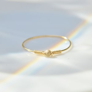 Thin minimalist ring in 14k gold filled and iridescent gold ball