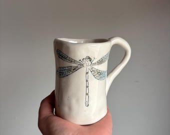 Porcelain mug with dragonfly inlay