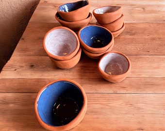 Tiny pinch pot dish with glazed interior