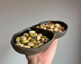 Double sectioned pinch pot snack bowl