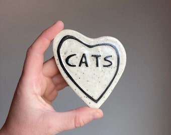 Cat love magnet