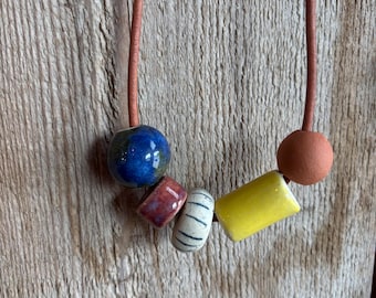 Leather necklace with handmade ceramic beads