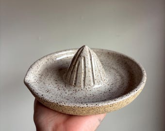 Speckled stoneware citrus juicer in white