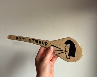 Pot stirrer with black hair