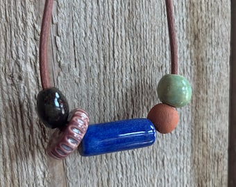 Leather necklace with handmade ceramic beads