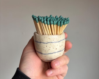 Blue striped match holder with teal hand dipped matches