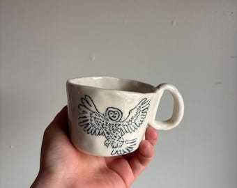 Porcelain mug with owl inlay