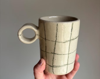 Loop handle mug with green checkerboard
