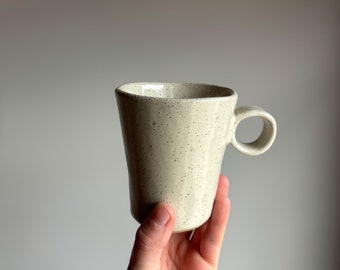 Loop handle mug with almond white glaze