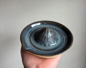 Small stoneware citrus juicer in blue