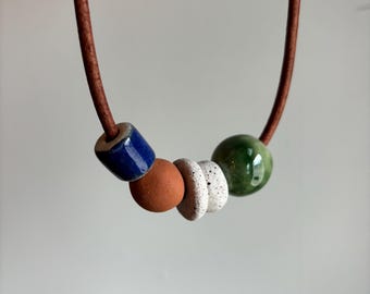 Leather necklace with handmade ceramic beads